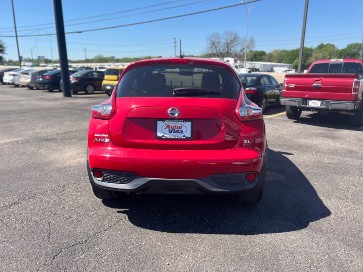 2015 RED Nissan Juke S FWD (JN8AF5MR3FT) with an 1.6L L4 DOHC 16V engine, Continuously Variable Transmission transmission, located at 420 I-35E, Lancaster, TX, 75146, (469) 297-4144, 32.593929, -96.823685 - Photo#8